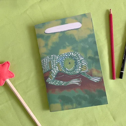 Caderno linhas camaleao